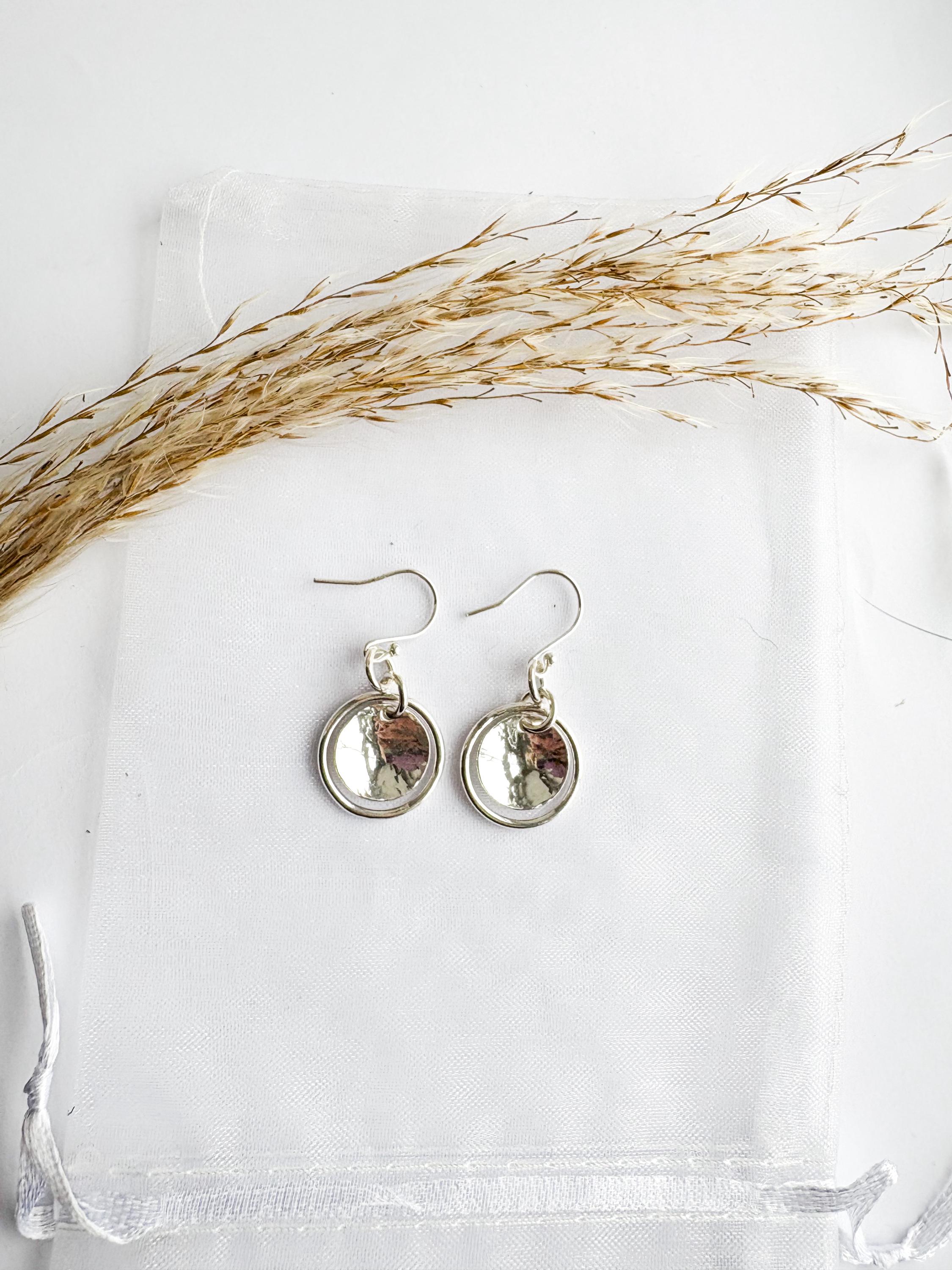 Domed circle drop earrings